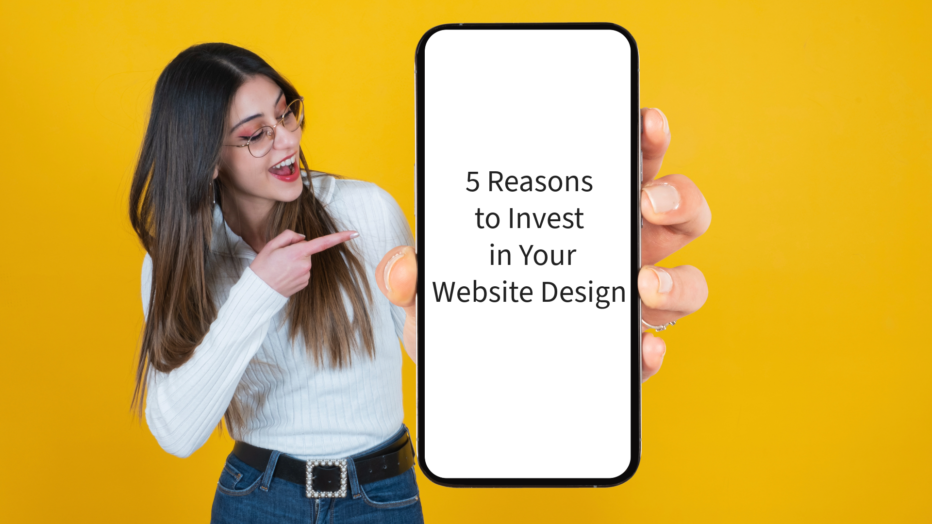 A woman holds a cell phone in her hand. On the screen it says "5 Reasons to Invest in Your Website Design"