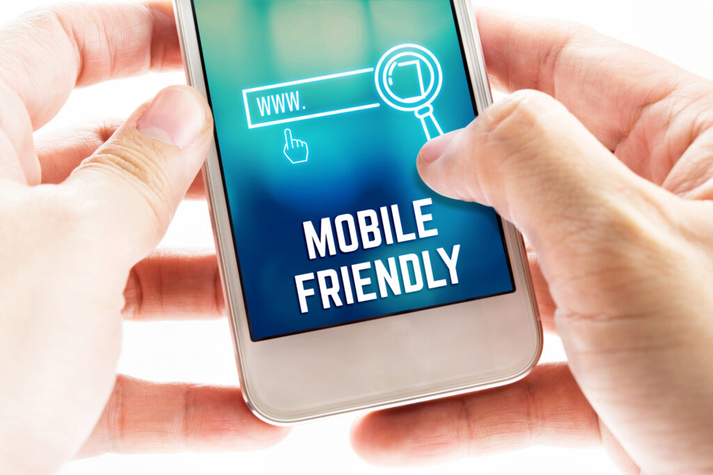 A person uses a mobile phone to shop online. Albuquerque SEO techniques can help make your e-commerce website more user-friendly for all devices. 